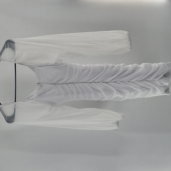 Elegant White Dress With Semi Transparent Sleeves - Picture 15 of 16